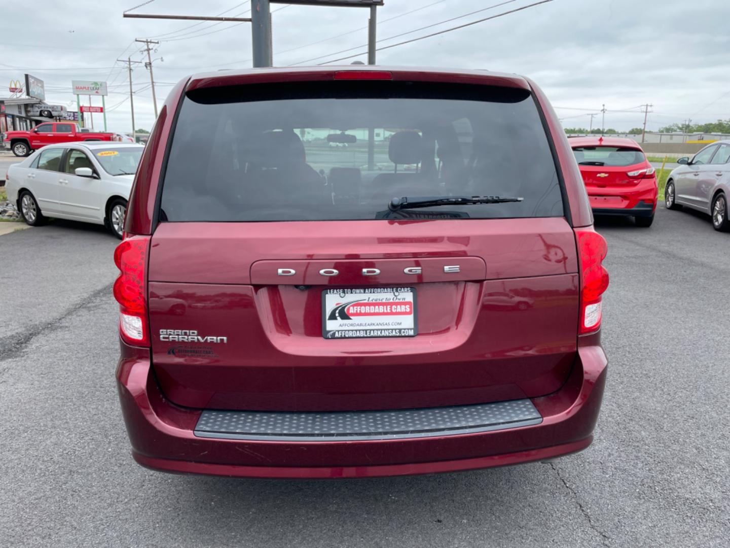 2017 Maroon Dodge Grand Caravan Passenger (2C4RDGBG9HR) with an V6, Flex Fuel, 3.6 Liter engine, Automatic, 6-Spd transmission, located at 8008 Warden Rd, Sherwood, AR, 72120, (501) 801-6100, 34.830078, -92.186684 - Photo#6